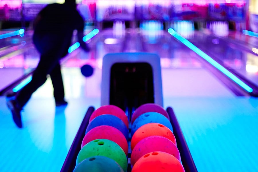 History of Cosmic Bowling