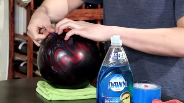 Cleaning and maintenance of reactive resin bowling balls