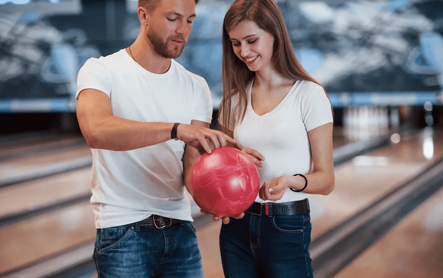 grasping the bowling ball